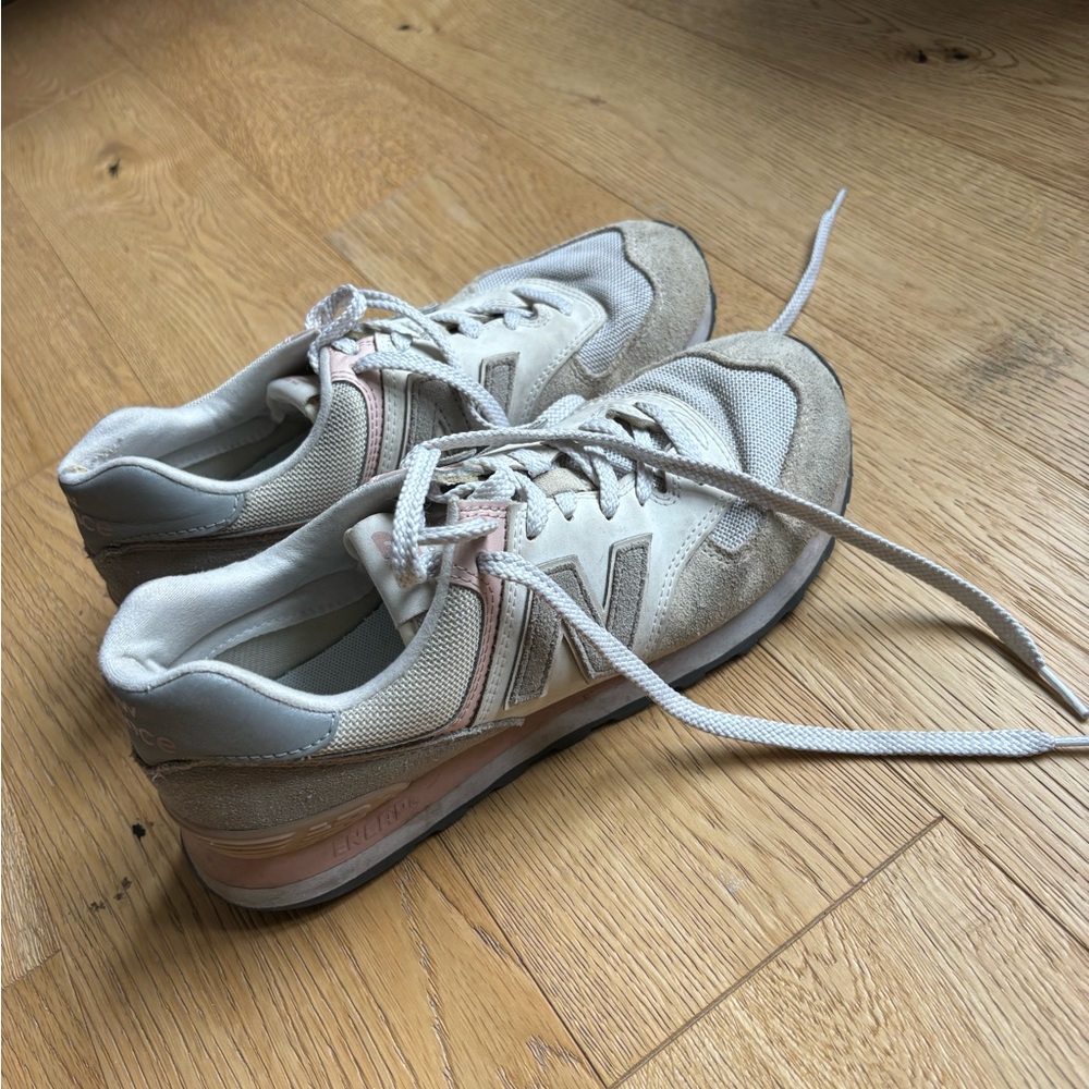 Pink and tan New Balance sneakers